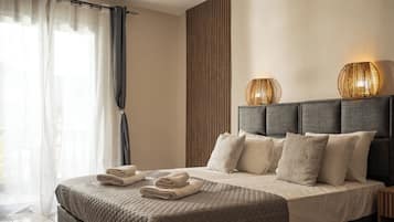 Comfort Suite, Garden View, Ground Floor | In-room safe, desk, iron/ironing board, free WiFi