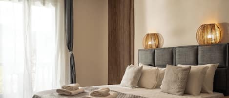 Comfort Suite, Garden View, Ground Floor | In-room safe, desk, iron/ironing board, free WiFi