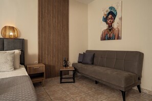 컴포트 스위트, 정원 전망 | 객실 내 금고, 책상, 다리미/다리미판, 무료 WiFi