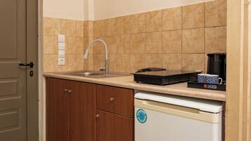 Mini-fridge, stovetop, coffee/tea maker, electric kettle