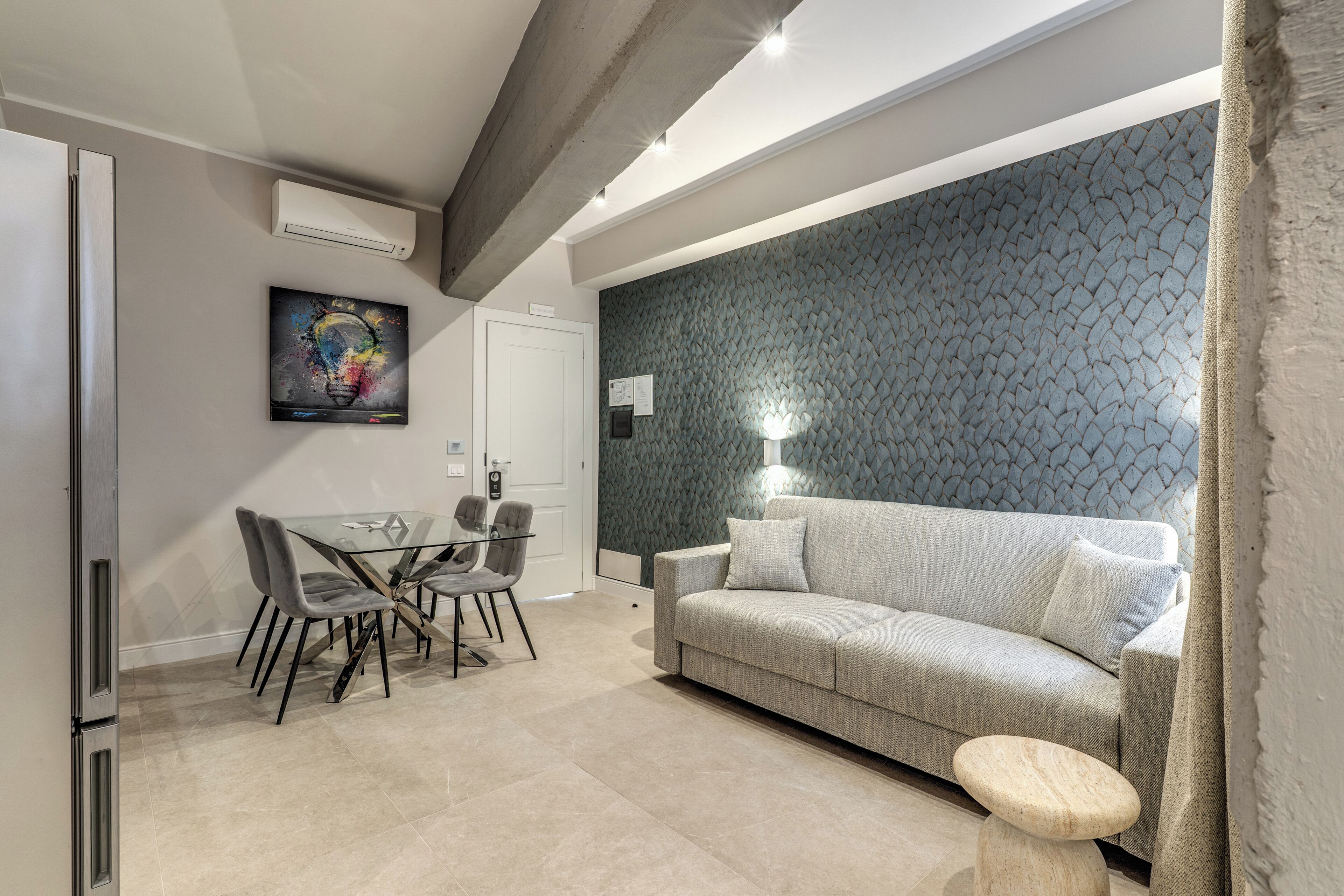 Chambre quadruple Deluxe | Aire de séjour
