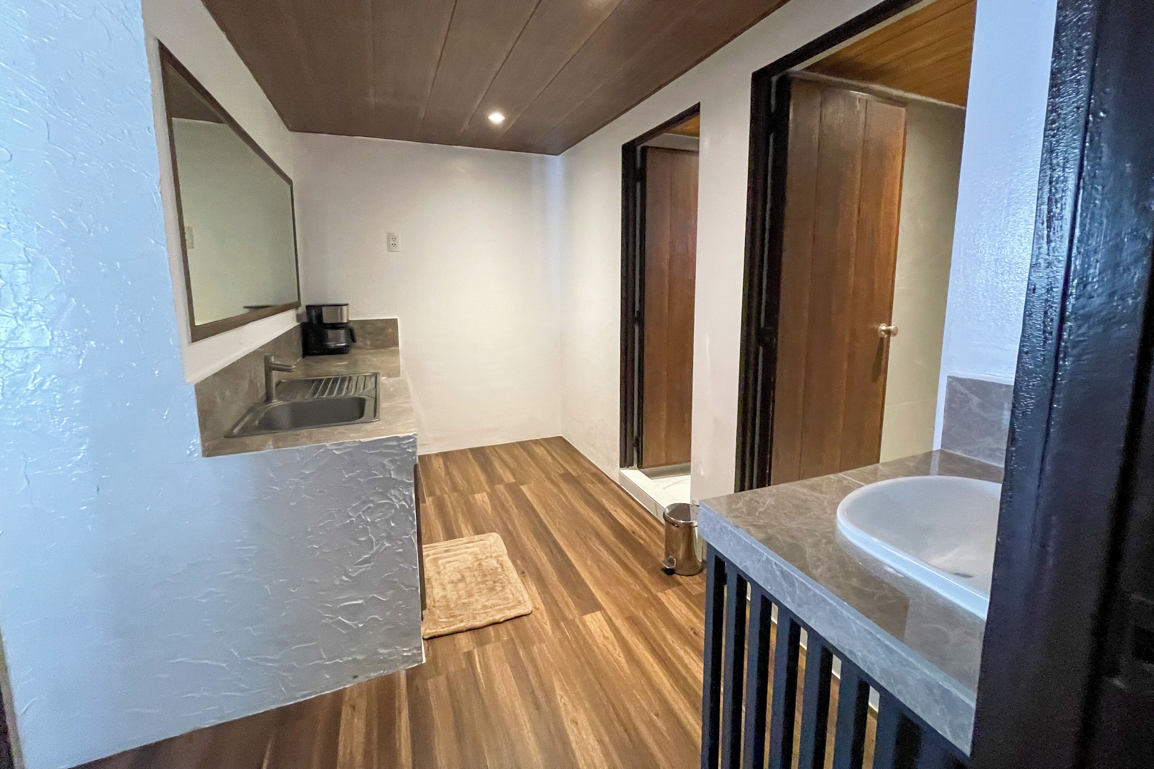 Thee Bedroom Suite | Living area | 32-inch TV with cable channels