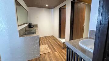 Thee Bedroom Suite | Living area | 32-inch TV with cable channels