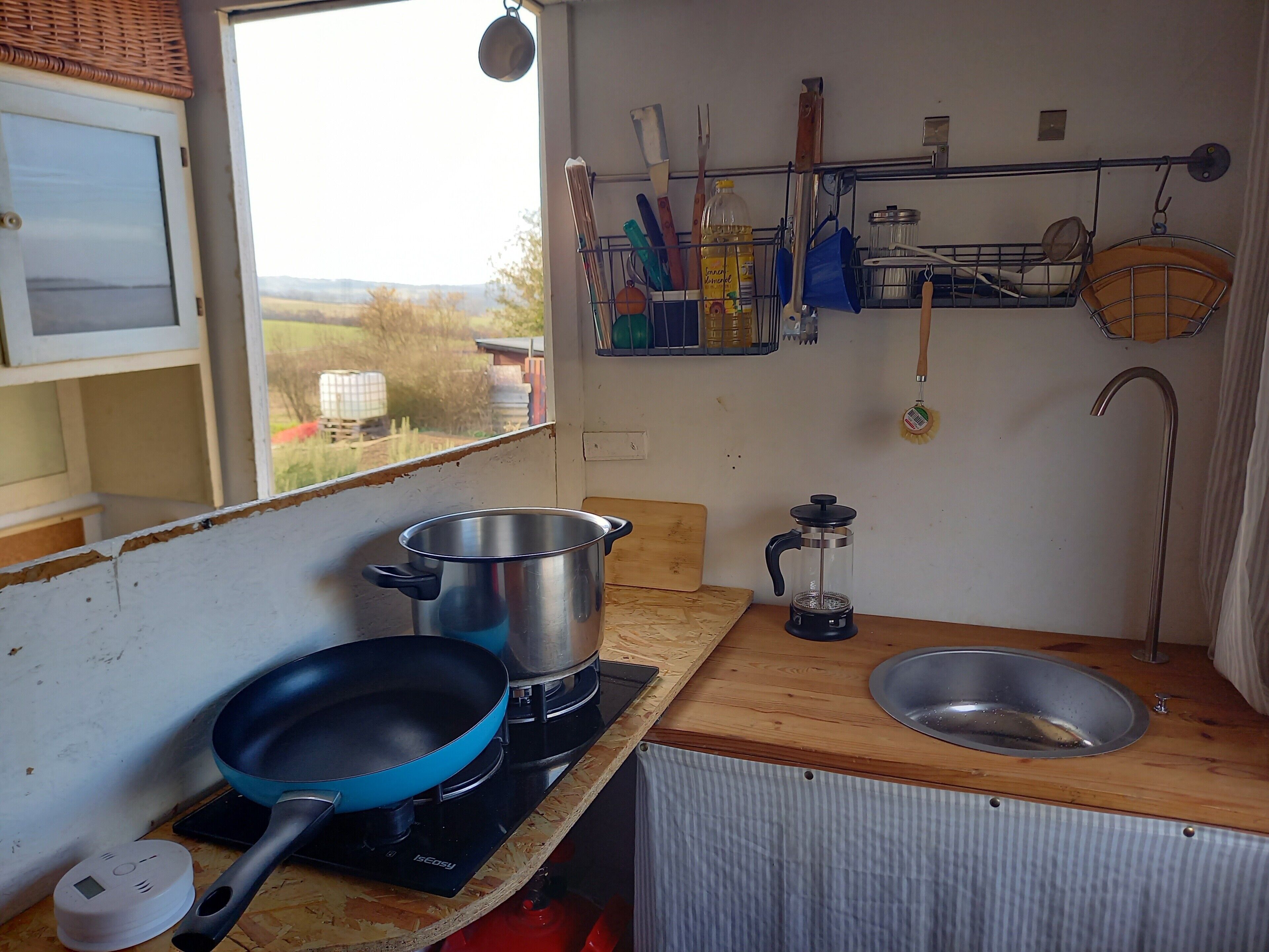 Fridge, stovetop, coffee/tea maker, cookware/dishes/utensils
