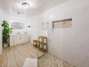 Shower, hair dryer, towels