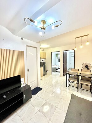Family Condo, 2 Bedrooms, Kitchen, Courtyard View | Interior - 2BR Urban Deca Homes Banilad by Gerra755 (Mandaue)