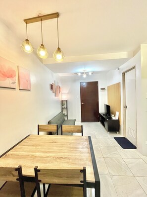 Family Condo, 2 Bedrooms, Kitchen, Courtyard View | Interior - 2BR Urban Deca Homes Banilad by Gerra755 (Mandaue)
