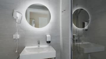 Standard Double Room | Bathroom | Shower, hair dryer, towels, soap