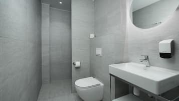 Standard Studio | Bathroom | Shower, hair dryer, towels, soap