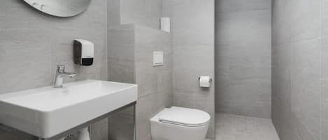 Standard Single Room | Bathroom | Shower, hair dryer, towels, soap
