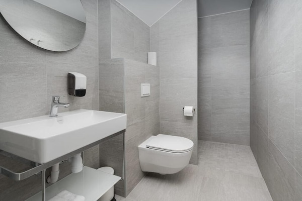 Standard Single Room | Bathroom | Shower, hair dryer, towels, soap