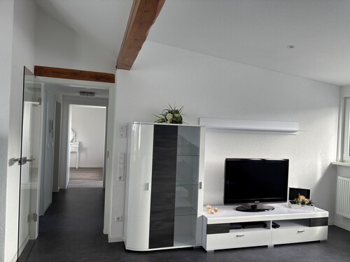 Bright top floor apartment with garden + pool, barbecue + chilling, cycling, hiking and excursions