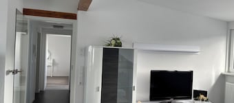 Bright top floor apartment with garden + pool, barbecue + chilling, cycling, hiking and excursions