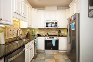 Fridge, microwave, oven, stovetop - Sea Suite Pensacola Beach Condo (Gulf Breeze)