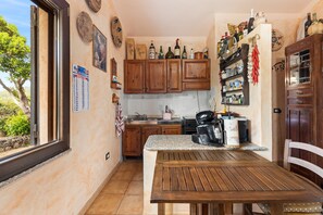 Frigorifero, piano cottura, macchina per tè/caffè