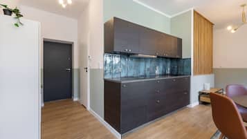 Apartment, City View | Private kitchen | Full-size fridge