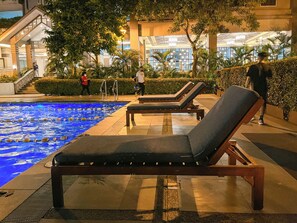 Pool - 1BR Condo with PS4 Karaoke Netflix Swimming Pool & Balcony (Quezon City)