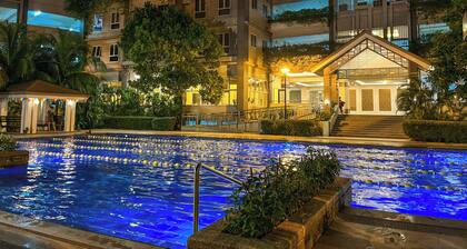 1BR Condo with PS4 Karaoke Netflix Swimming Pool & Balcony