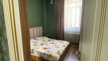 1 chambre, fer et planche Ă repasser, Wi-Fi, draps fournis