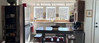 Restored barn in charming Lyme with studio apartment.