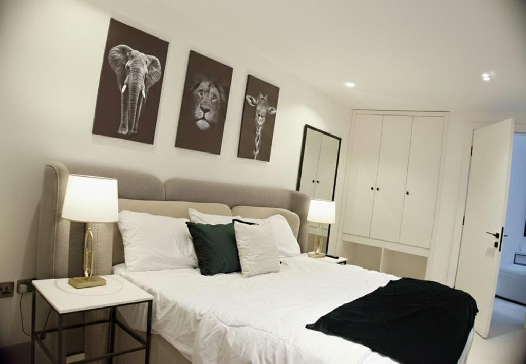 Deluxe Apartment, Balcony, City View | In-room safe, desk, laptop workspace, blackout curtains