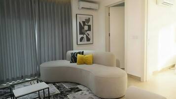 Deluxe Apartment, Balcony, City View | Living area