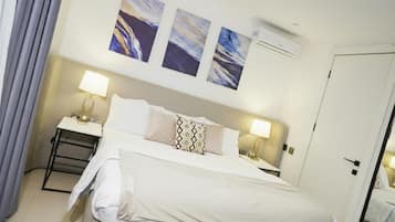 Deluxe Apartment, Balcony, City View | In-room safe, desk, laptop workspace, blackout curtains