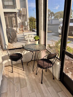 Outdoor dining - 2 bdrm condo, on the Intercostal, walk to the Gulf coast beach! (Madeira Beach)