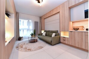 Studio Confort, vue ville | Coin séjour