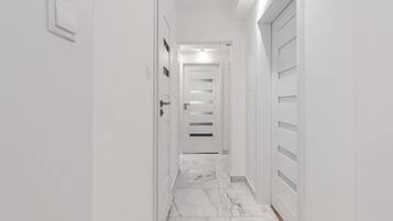 Comfort Apartment, City View | Premium bedding, blackout drapes, iron/ironing board, cribs/infant beds