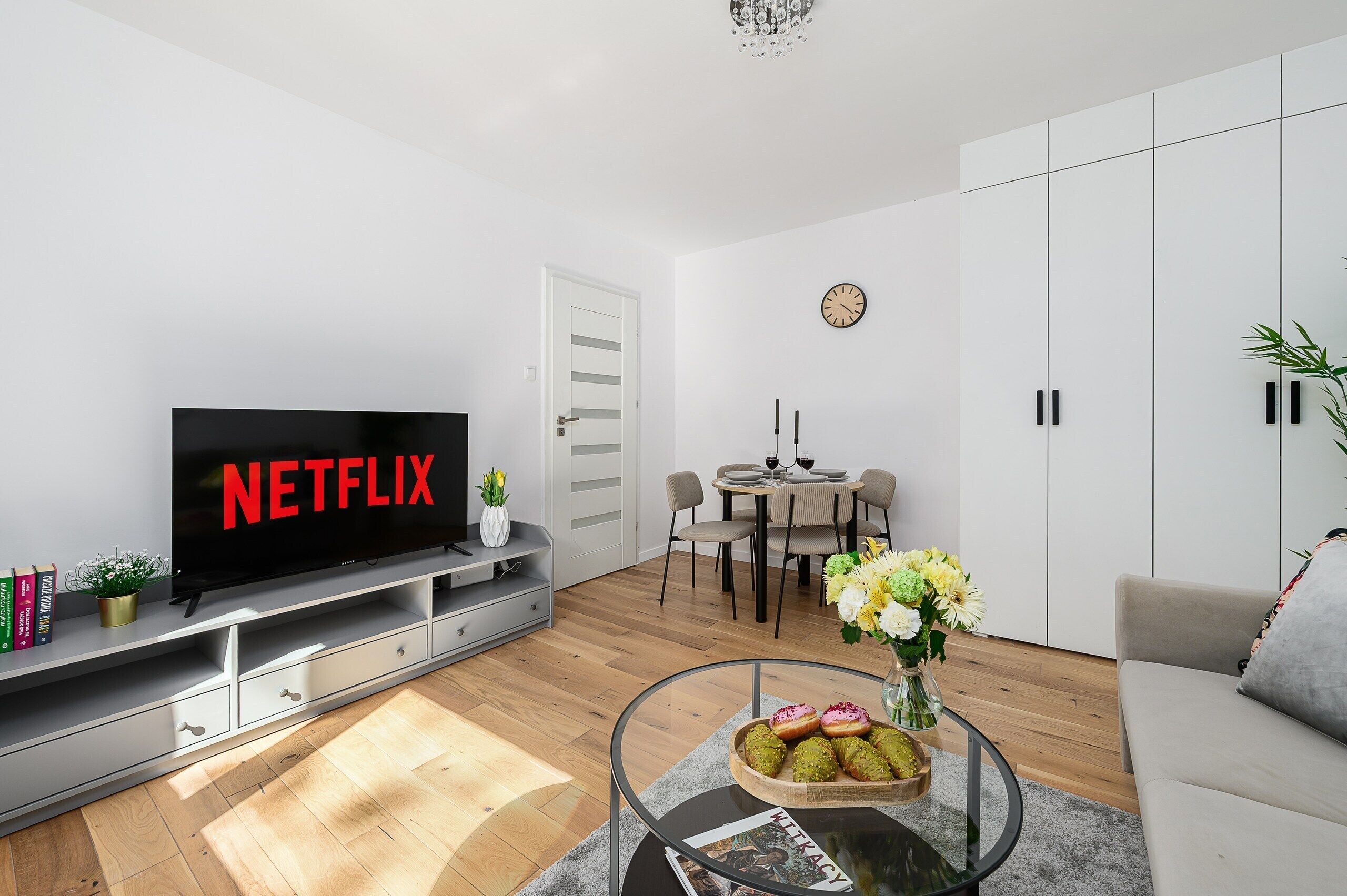 Comfort Apartment, City View | Living area | 50-inch flat-screen TV with cable channels