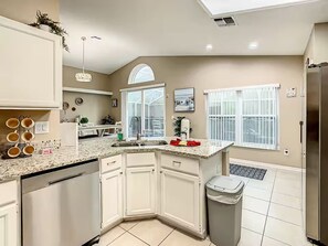 Fridge, microwave, oven, stovetop - Spacious Pool Home Near Disney | Sleeps 11 (Kissimmee)
