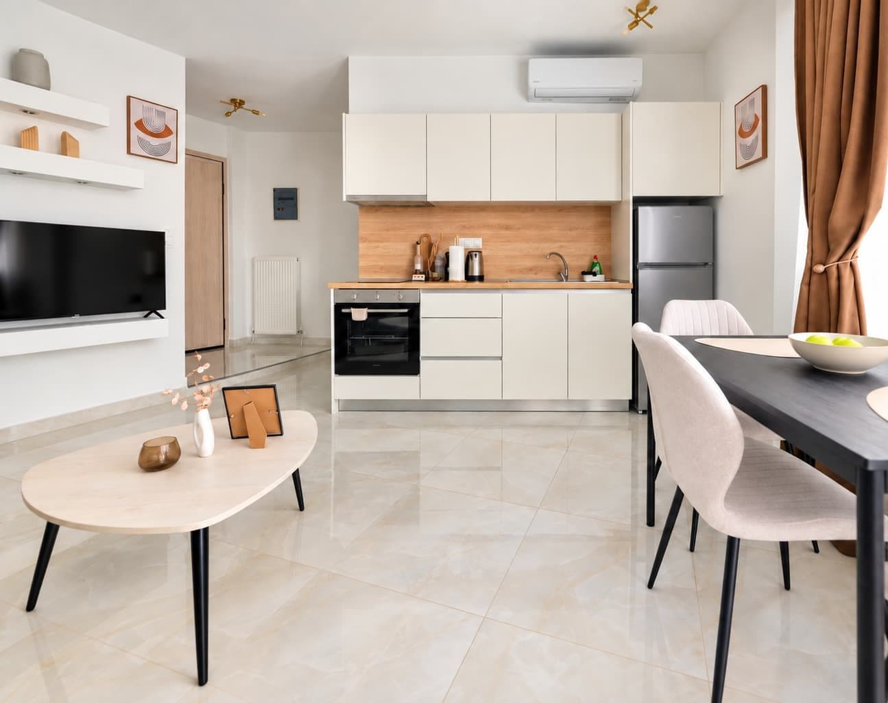 Enjoy a spotless, modern kitchen with sleek cabinetry, essential appliances and a welcoming dining area. Carefully equipped to make preparing meals and enjoying your stay effortless and comfortable.