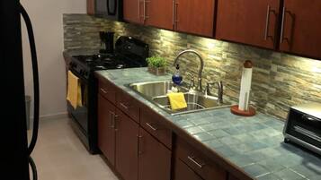 Fridge, microwave, coffee/tea maker, toaster