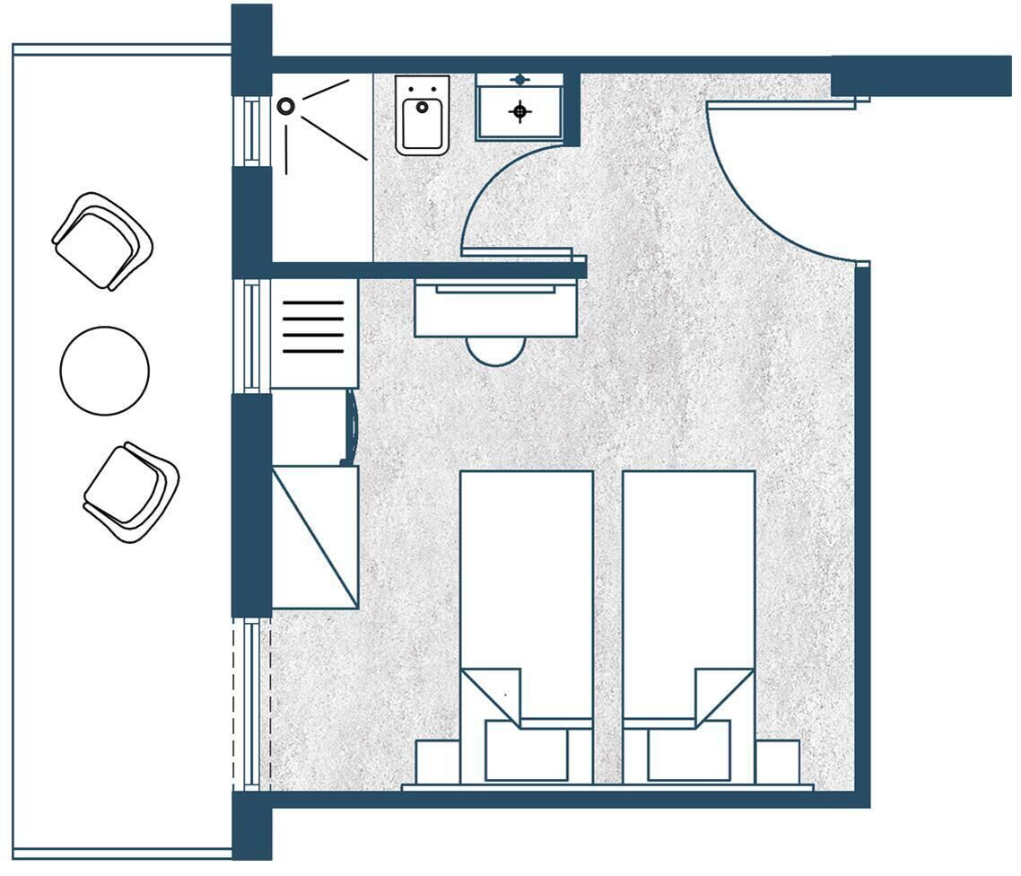 Distribución de una habitación de hotel con cama, escritorio, silla, mesita y ventana.