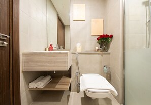 Shower, hair dryer, bidet, towels - Cozy Studio In Blue Bay Walk Ajmal Makan (Ajmal Makan)