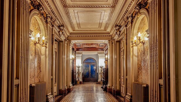 A grand hallway with ornate columns, chandeliers, and a patterned floor. - Chateau Antares - Eight Bedroom Castle, Sleeps 16 (Marcorignan)