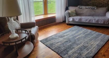 Lovely 2-bedroom farmhouse with central heat/AC in a quiet country setting.