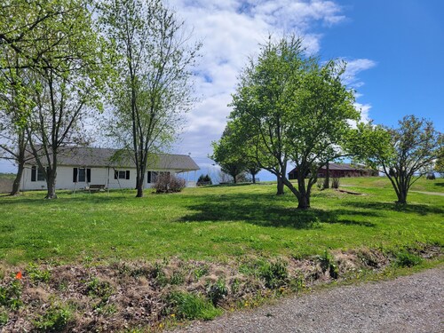 Lovely 2-bedroom farmhouse with central heat/AC in a quiet country setting.