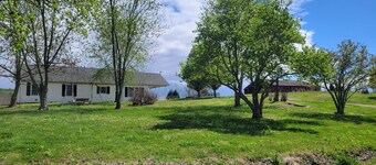 Lovely 2-bedroom farmhouse with central heat/AC in a quiet country setting.