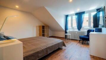 1 chambre, fer et planche Ă repasser, Wi-Fi, draps fournis