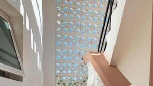 A staircase with wooden steps and white railings. - cosy by-beach retreat!Warm private escape with private pool (Kwale County)
