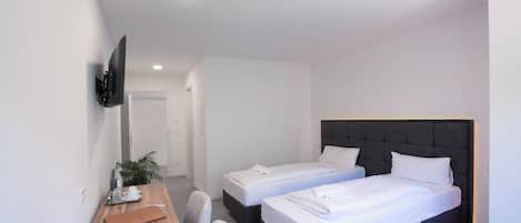 Chambre Deluxe double | Espace de travail pour ordinateurs portables, rideaux dâobscurcissement