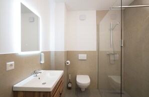 Deluxe tweepersoonskamer | Badkamer