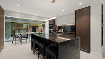 Coffee/tea maker, fridge, microwave, oven
