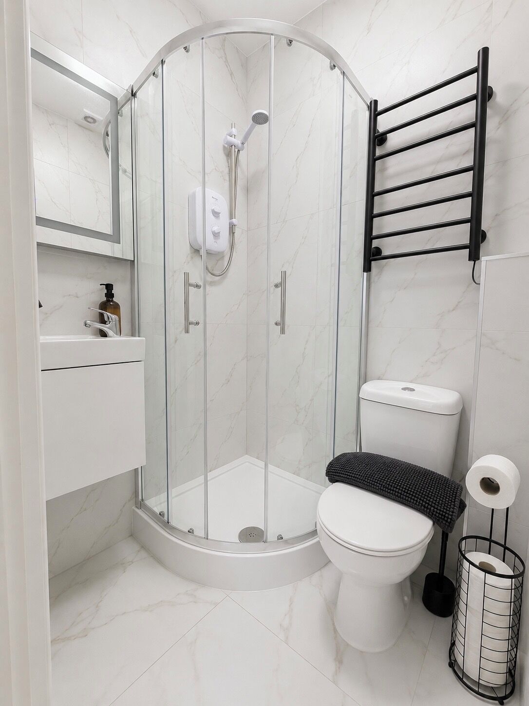 Hair dryer, towels, soap, shampoo