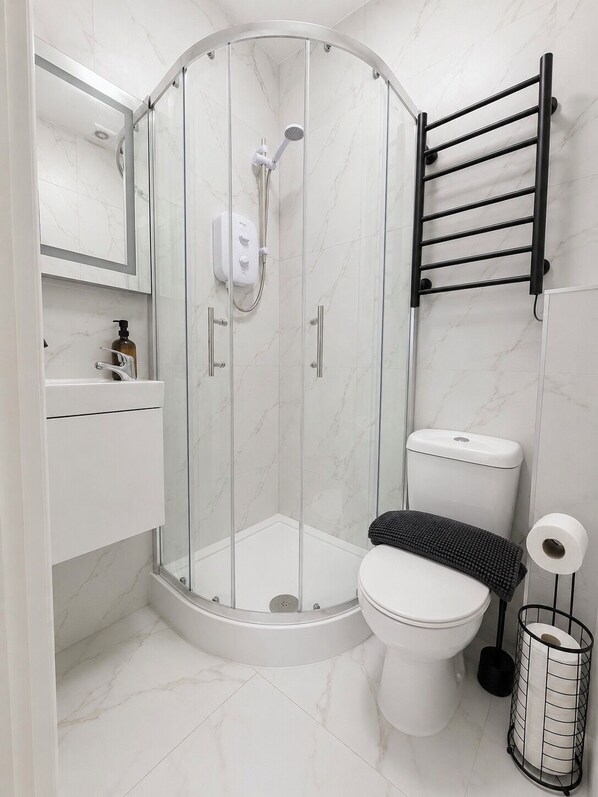 Hair dryer, towels, soap, shampoo