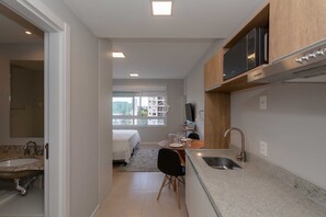 Iron/ironing board, Internet, bed sheets - Studio Cubanos | Gestão Premium + Ao lado da PUC (Porto Alegre)