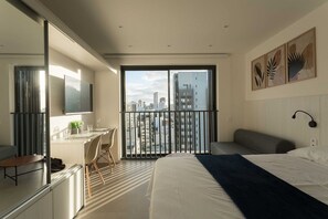 Iron/ironing board, bed sheets - Studio Elegante e Conectado em Porto Alegre (Porto Alegre)