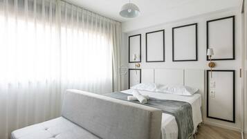 Ferros/tábuas de passar roupa, acesso à internet, roupa de cama